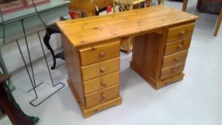 Modern pine dressing table. Height 76.5cm width 127.5cm depth 54.5cm