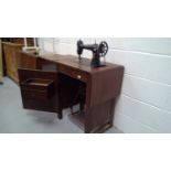 Singer sewing machine and table, cast iron frame