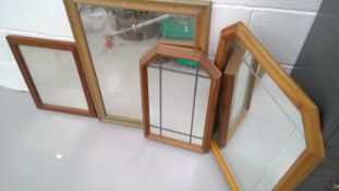 Pine framed mirror and three other mirrors.