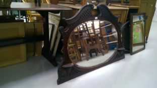 Oak overmantle mirror with a beveled edge. Height 79.5 width108cm