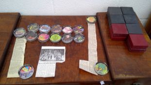 A collection of St Ives Kidz R Us paperweights ranging from 2003 to 2009. Includes related newspaper