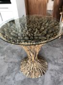Round glass top driftwood pedestal table height 81cm circumference 75cm.