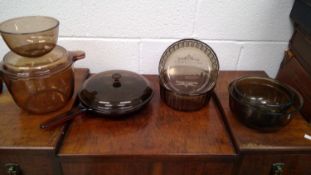 Vintage glass cooking utensils including Vision frying pan and lid, Vision large pot and cover,