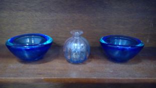 Peter Tysoe glass bottle vase and two blue glass bowls.