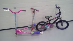 A "Tink" child's bike, and two scooters.