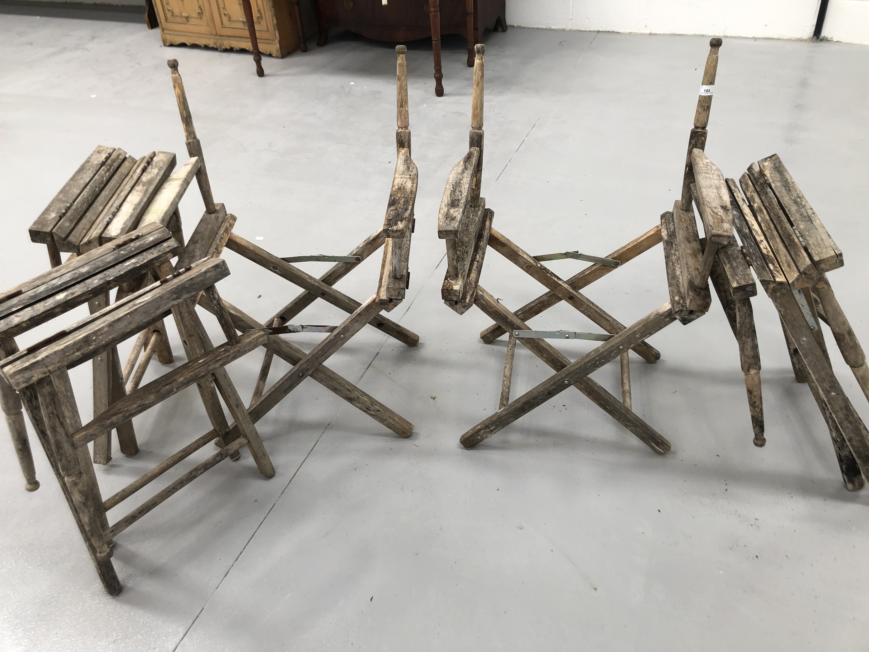 Five folding garden chair frames.