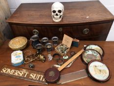 Plaster skull, St Justin bracelet, Rabone chesterman Ltd measuring tape, keys, Viners of Sheffield