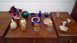 A range of different ceramic and glass items.