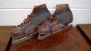 Vintage "Invictus" ice skates.