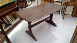 Oak dining table, possible makers mark. Height 71.5cm width 137cm depth 71.5cm