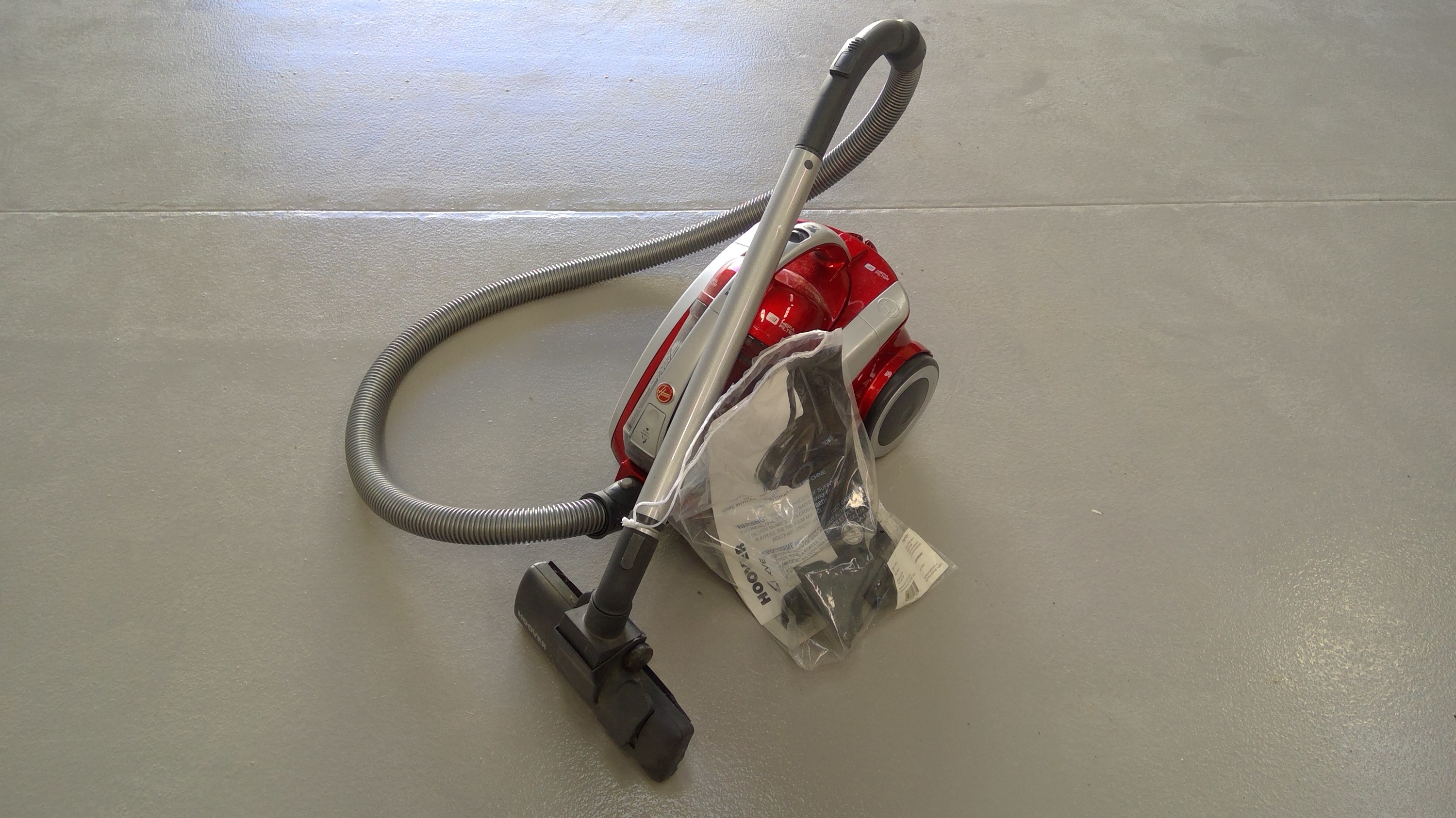 A "Curve" Hoover with accessories.
