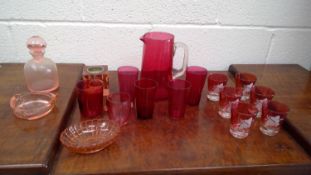 Cranberry glass lemonade set, and other cranberry glass.