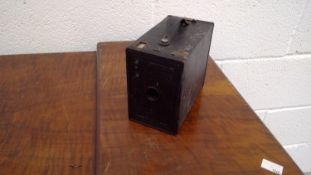 A Kodak 'The Brownie No. 2A' vintage box camera. Comes with a box of mixed items including