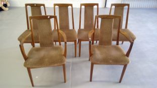 Six G-Plan teak dining chairs with original "honeycomb" fabric seats.