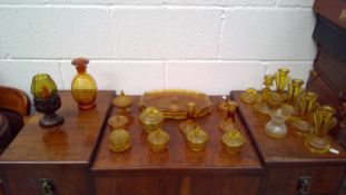 A yellow glassware collection.