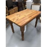 Modern pine kitchen table, height 79cm width 122cm depth 75cm.