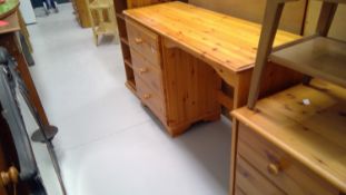 Modern pine desk with three drawers. Height 71.5cm width 115.5cm depth 41cm