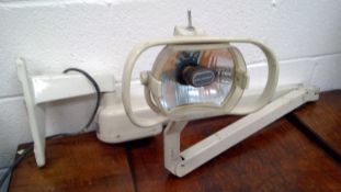 A Belmont wall-mounted "dentist" lamp.