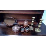 Copper hot chocolate pot, pair of brass candlesticks, copper kettle, and other copper items.