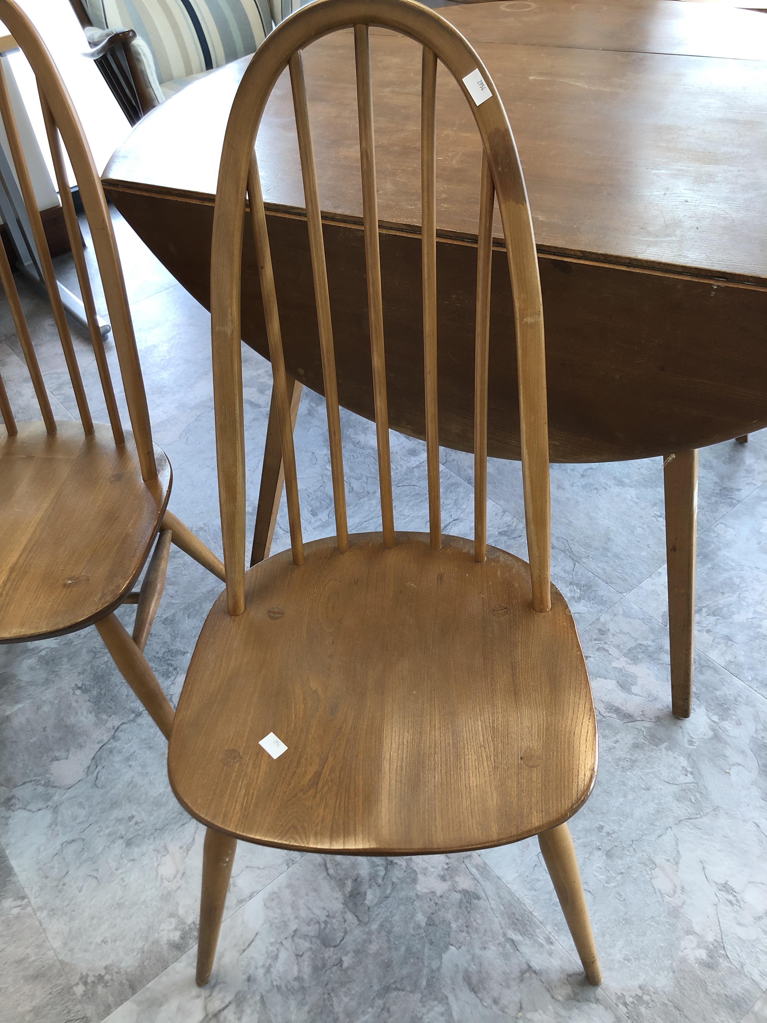 Ercol drop leaf table, height 71cm width 114cm depth 63cm, and a matching pair of Ercol chairs. - Image 2 of 4