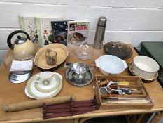 Box of kitchenalia including AGA kettle,cutlery Royal Canin digital scales,cookery books, thermos