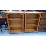 A pair of pine open bookshelves. Height 95.5cm, width 67.5cm, depth 29cm.