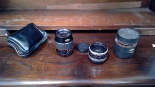 Carl Zeiss Jena DDR 2,8/35 lens, Mirage auto reflex 135mm lens.