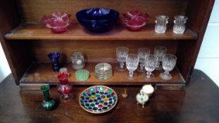 Crystal wine glasses, scent bottle in porcelain egg, other various coloured glass items