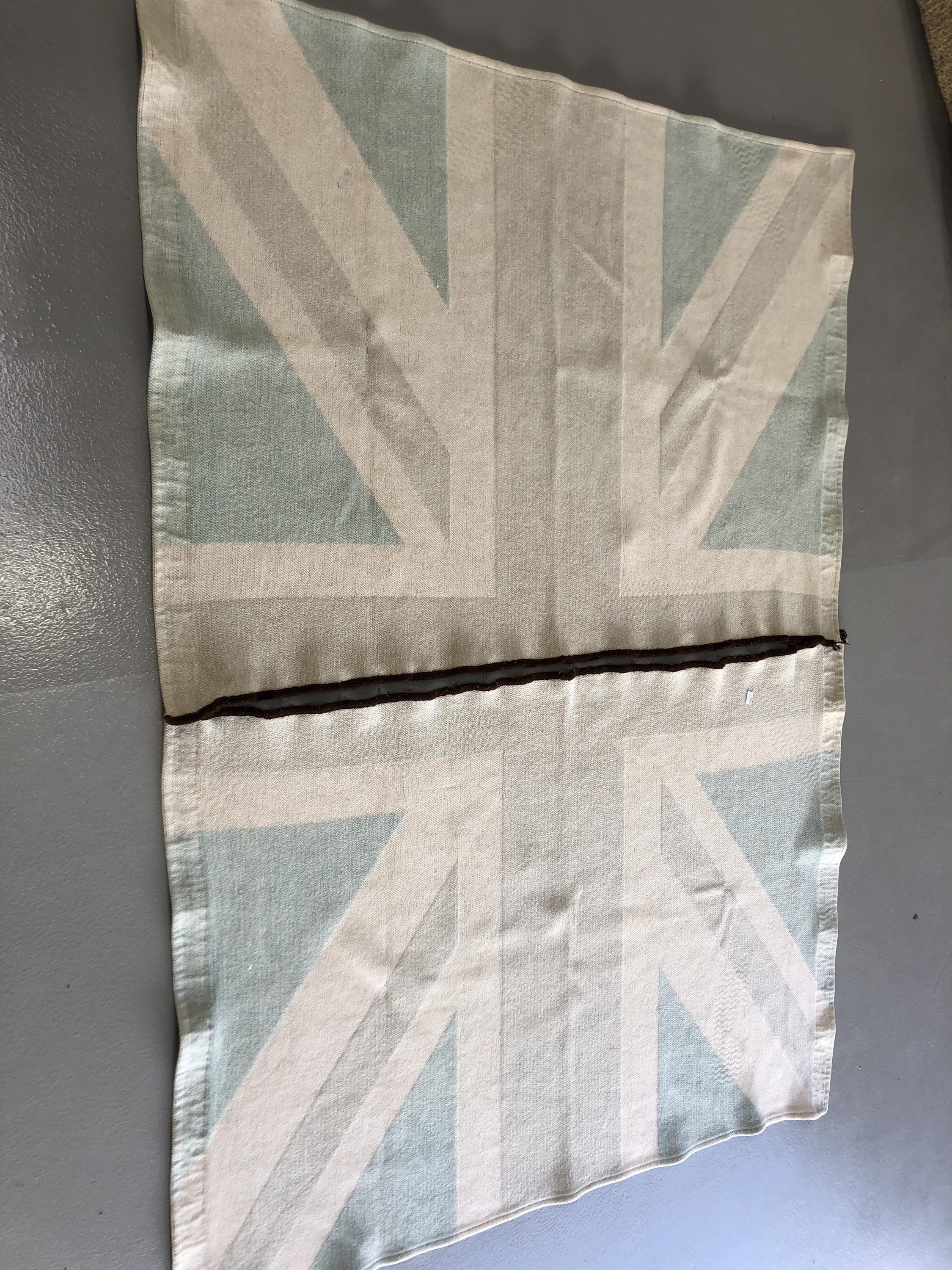 Pair of Luara Ashley cream and teal Union Jack rugs 106cm x 143cm.