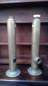 Two large brass cylinders PUMP impressed to base, height 61cm diameter 8.5cm.