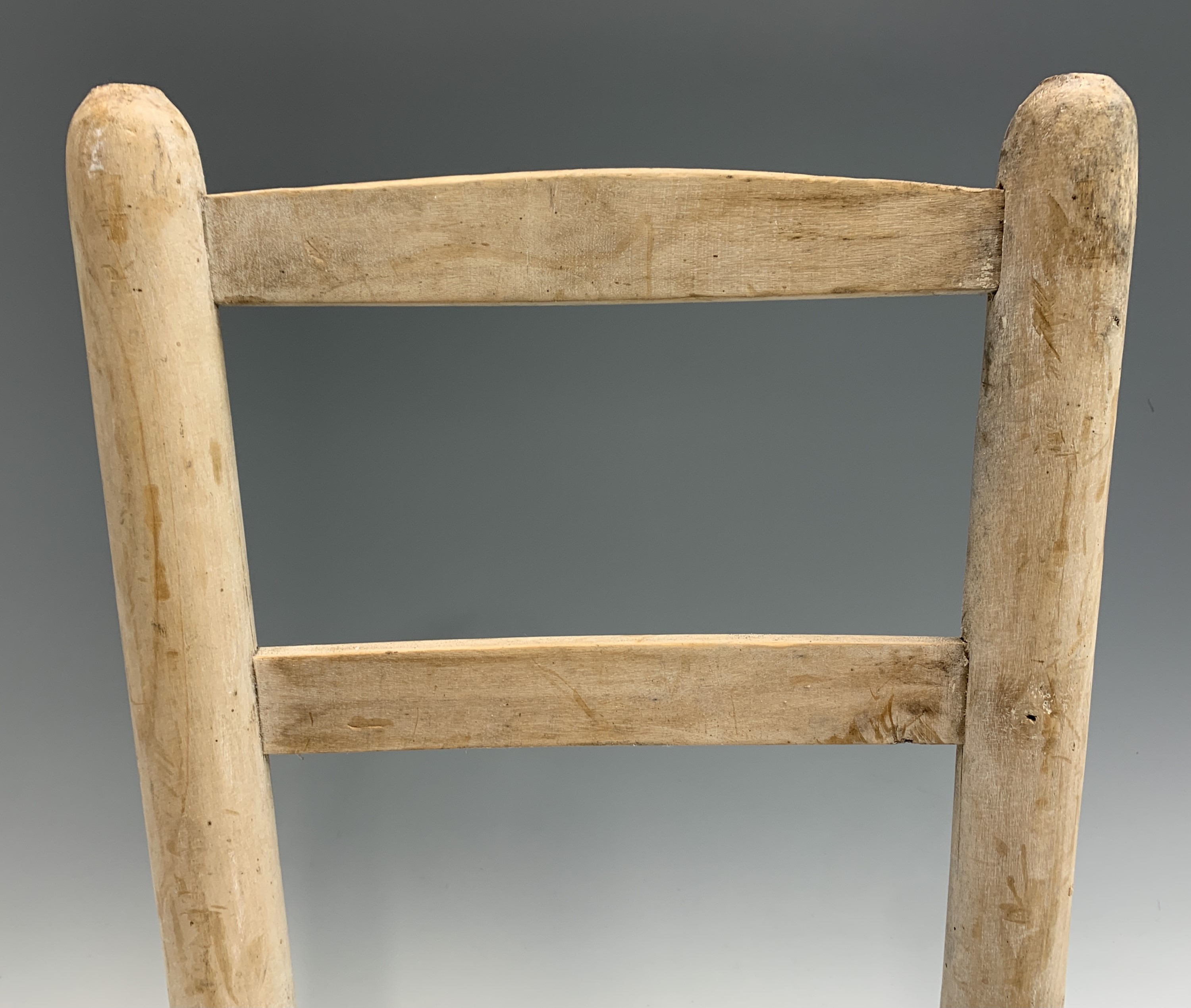 A pine ladderback child's chair frame. Height 53.5cm, width 35.5cm, depth 28cm.Condition report: - Image 3 of 4