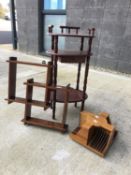 A set of hanging shelves, a hall table and a small carousel leaflet holder.