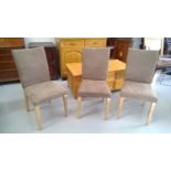 Three modern dining chairs with suede style upholstery