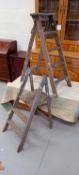 A Youngman wooden folding stepladder and a similar smaller set.