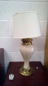 A ceramic table lamp, with brass mounts.