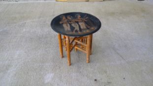 Egyptian copper table with folding table.