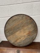 Iron bound barrel lid. Circumference 62.5cm depth 4.5cm