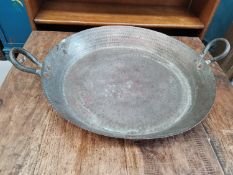 Large copper paella dish, width 19cm.