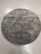 An Ikea circular rug, diameter 130cm.
