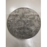 An Ikea circular rug, diameter 130cm.