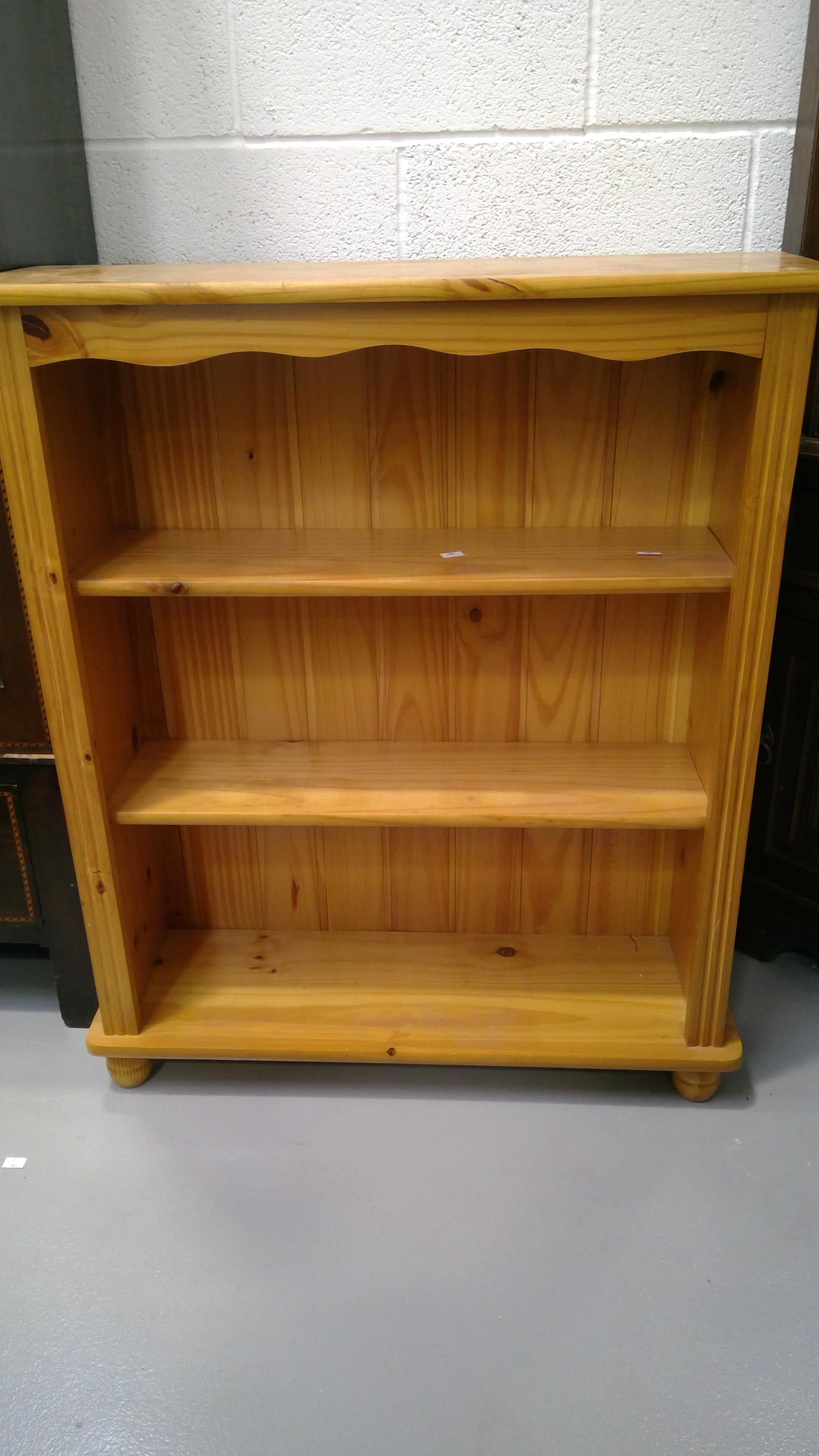 Modern pine open bookcase.