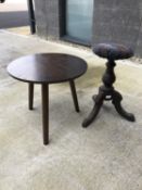 A late Victorian piano stool and an occasional table.