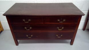 Mahogany inlaid chest of drawers, height 63cm width 107cm depth 51cm.