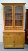 Modern dresser with glazed doors, height 216cm width 100cm depth 62cm.