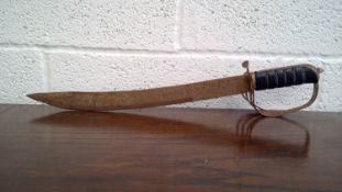 Rusted cutlass with a branch guard.