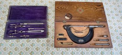 A cased J.T Slocomb micrometer and a draughtsman's set.