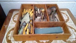 A cutlery tray with miscellaneous stainless steel and silver plated cutlery