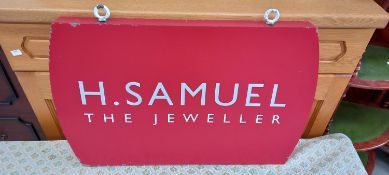 A heavy double-sided metal 'H. Samuel, The Jewellery' sign.