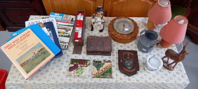 A leather-worked cigarette box, dominoes, a wood cased barometer and other miscellanea.