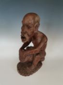 African carved wooden sculpture.